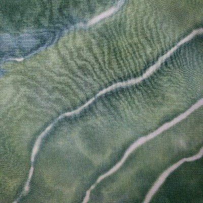 Hazy Green, dye over ice, tied with sinew in geode lines on underwear cotton.