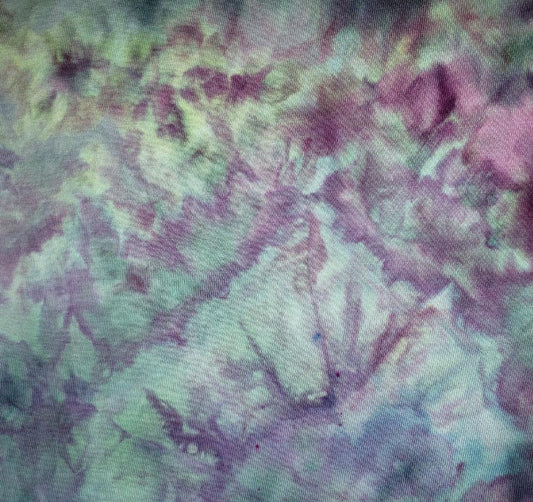 Dye over ice, scrunched on a 100% cotton t-shirt.