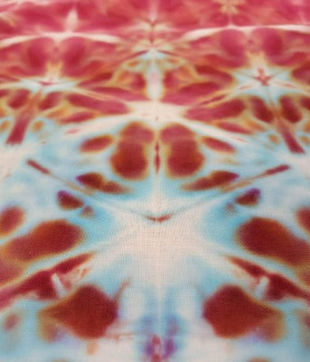 Shibori fold, dye under ice. Photo credit: Margo Farnsworth.