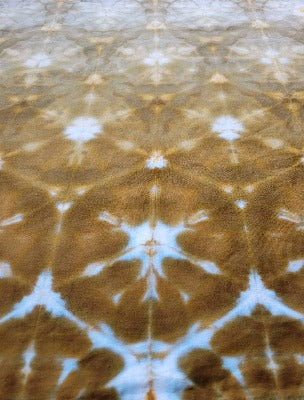 Shibori fold, dye under ice. Photo credit: Margo Farnsworth.