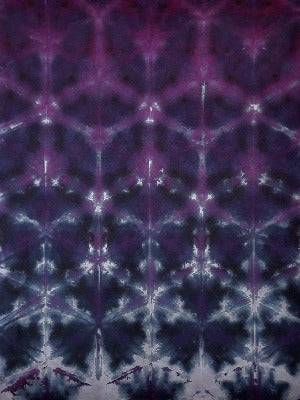 Shibori fold, dye under ice. Photo credit: Margo Farnsworth.