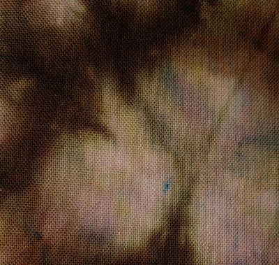 Scrunched, dye under ice. Heavy handed on quilter's cotton.