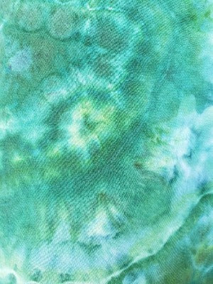 Dye over ice, loose geode on a cotton tee.