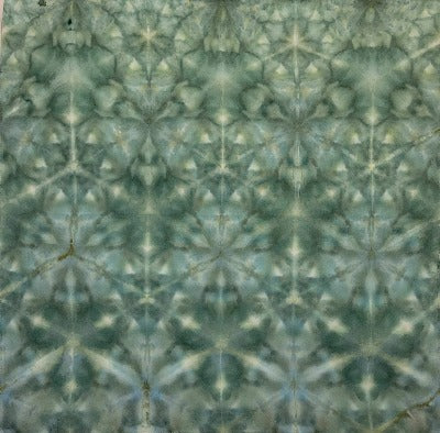 Shibori fold, dye under ice. Photo credit: Margo Farnsworth.