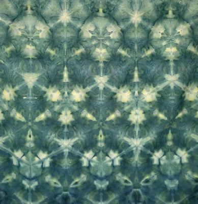 Shibori fold, dye under ice. Photo credit: Margo Farnsworth.